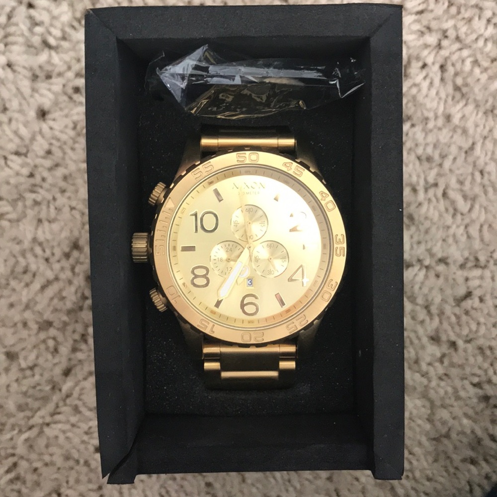 NIXON gold watch